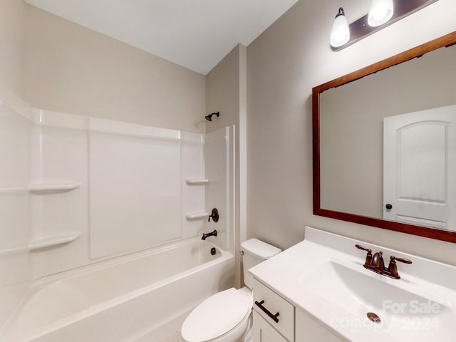 full bathroom with washtub / shower combination, vanity, and toilet