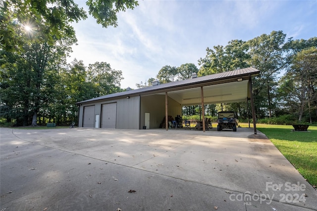 garage with a lawn