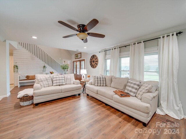 living room with recessed lighting, a ceiling fan, and wood finished floors