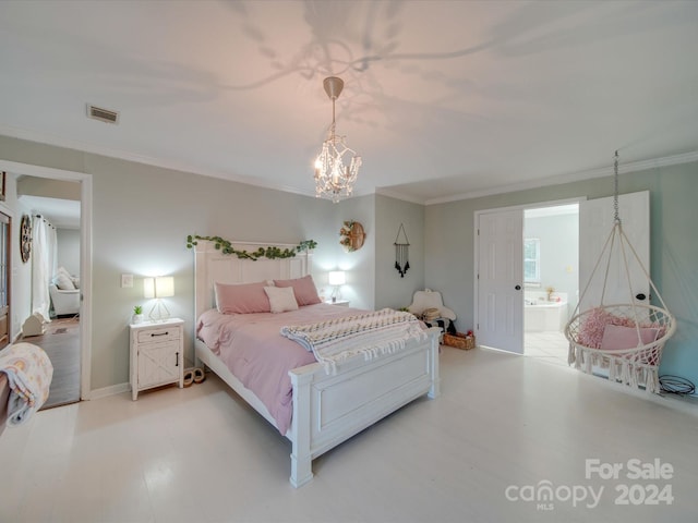 bedroom featuring connected bathroom, ornamental molding, and a chandelier