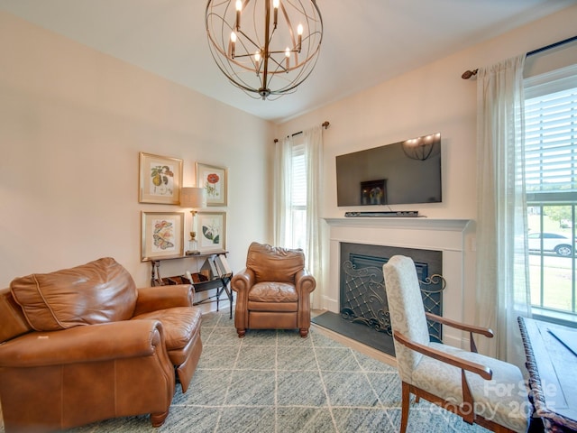 sitting room with an inviting chandelier and a wealth of natural light