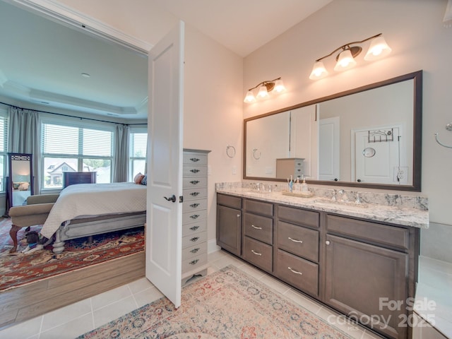 bathroom featuring vanity and tile patterned flooring