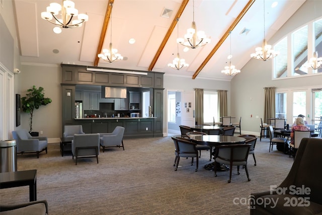 carpeted dining room featuring high vaulted ceiling, a wealth of natural light, and beam ceiling