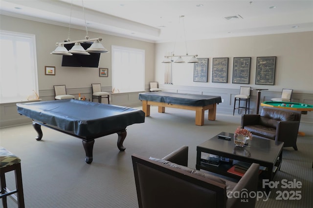 game room with pool table, ornamental molding, and carpet flooring