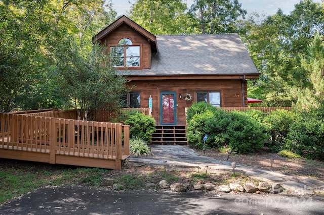 view of front of home with a deck