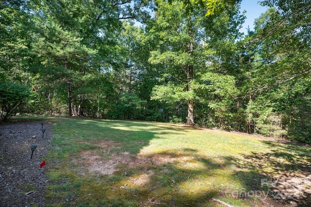 117 Laurel Lakes Pkwy, Lake Lure, NC 28746 - view of grassy yard featuring a forest view