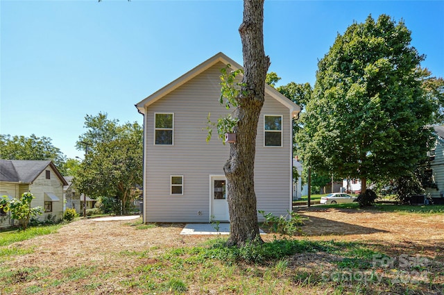 rear view of house with a patio area