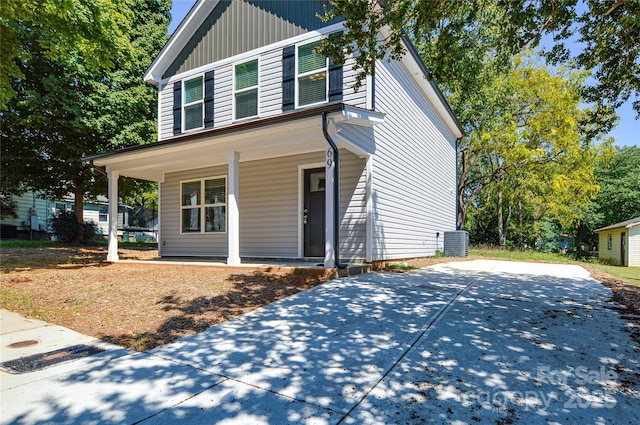 view of front of property with central AC unit and covered porch