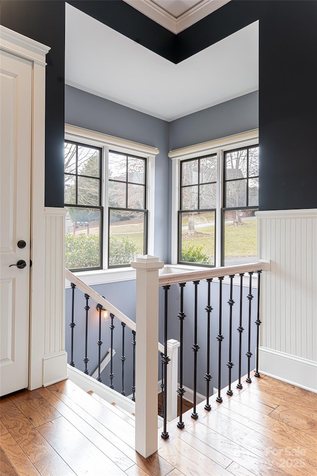 stairs featuring hardwood / wood-style flooring