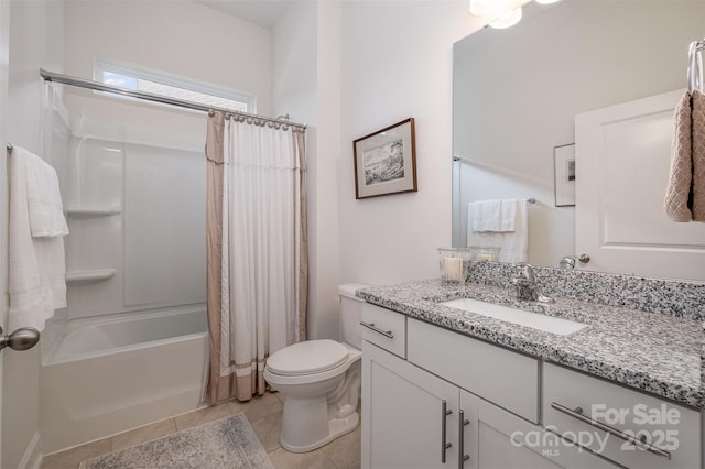 full bathroom featuring toilet, tile patterned floors, vanity, and shower / bathtub combination with curtain