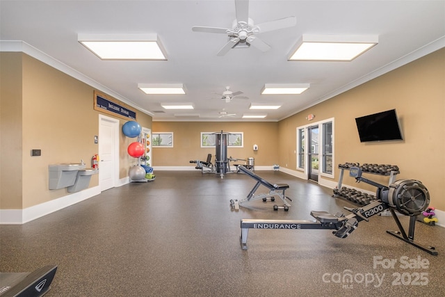 workout area with crown molding and ceiling fan