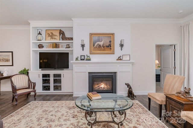 living room with dark hardwood / wood-style floors and ornamental molding