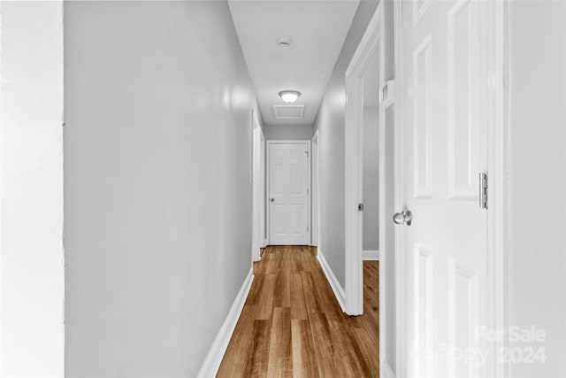 hall featuring light hardwood / wood-style flooring