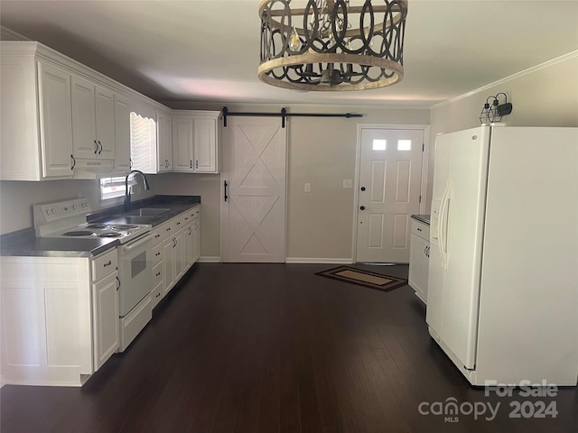 kitchen featuring dark hardwood / wood-style floors, white appliances, sink, white cabinetry, and a barn door