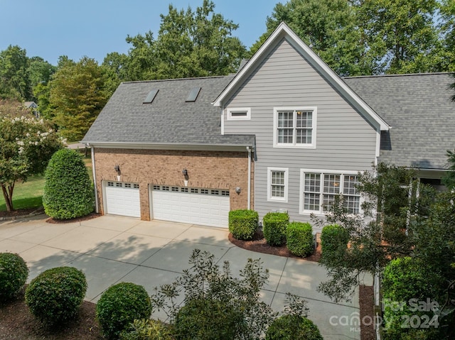 exterior space with a garage