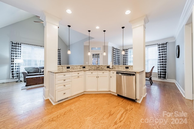 kitchen with dishwasher, plenty of natural light, kitchen peninsula, and lofted ceiling