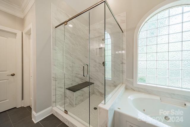 bathroom featuring plus walk in shower, ornamental molding, tile patterned floors, and a healthy amount of sunlight