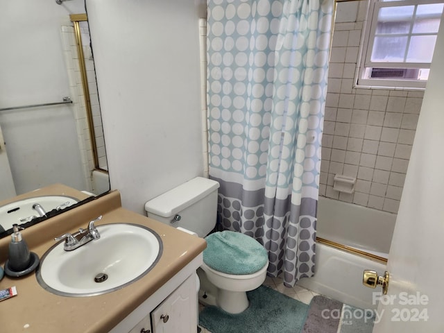 full bathroom with vanity, toilet, shower / tub combo, and tile patterned floors