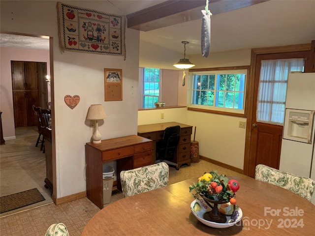 dining area with tile patterned floors and baseboards