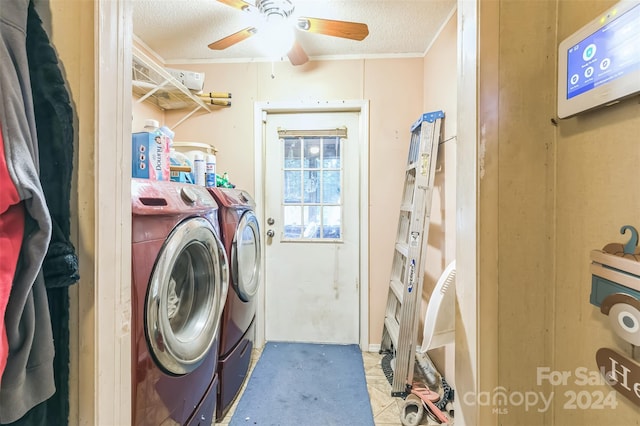 clothes washing area with ornamental molding, a textured ceiling, washer and dryer, and ceiling fan