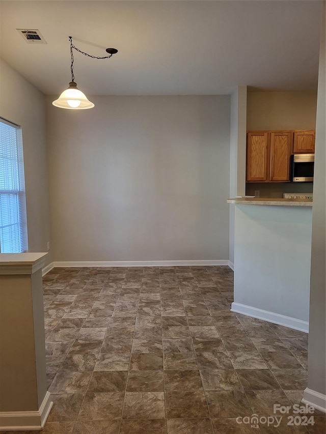 view of unfurnished dining area