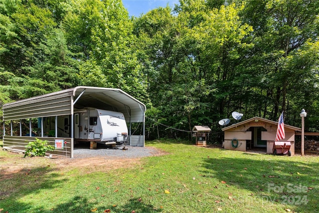 view of yard featuring a carport