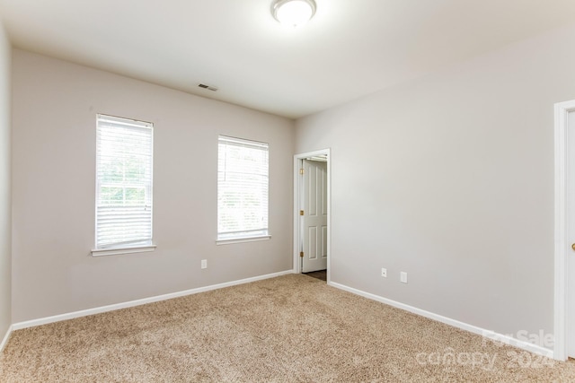 view of carpeted spare room