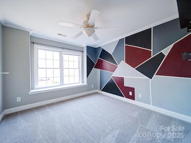 unfurnished bedroom with crown molding, ceiling fan, and carpet