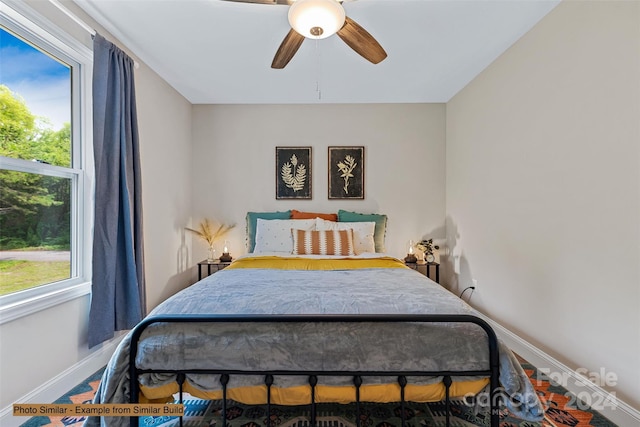 bedroom featuring ceiling fan