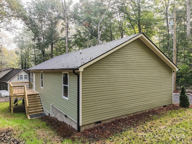 view of home's exterior with a deck