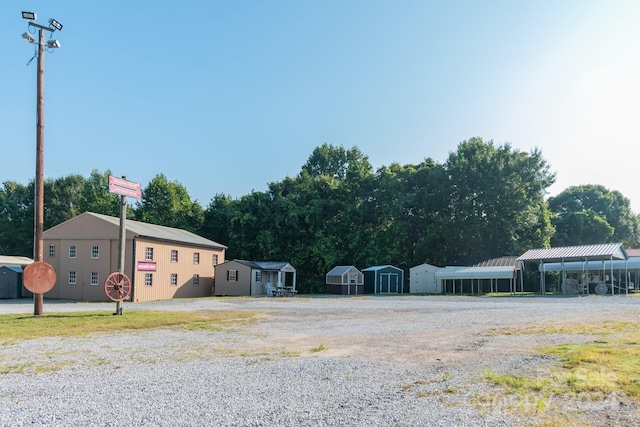 view of outbuilding with a carport