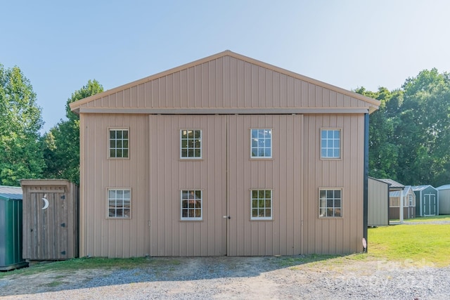 view of home's exterior featuring a storage shed