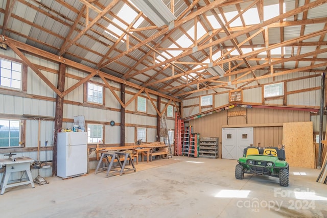 garage featuring white refrigerator