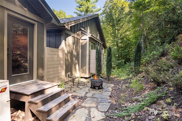 view of patio / terrace featuring an outdoor fire pit