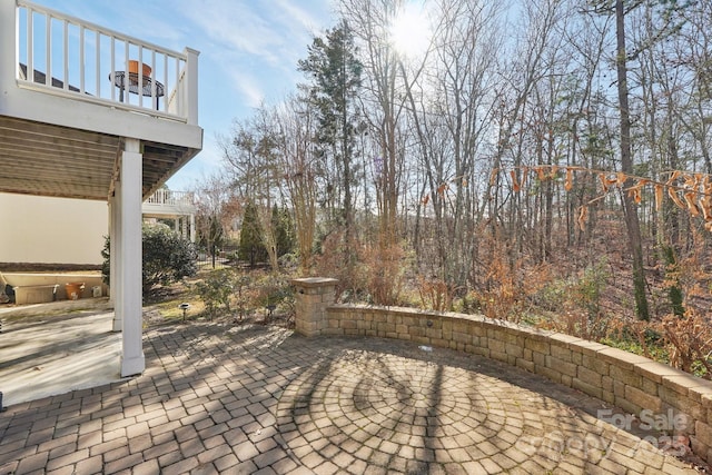 view of patio / terrace with a balcony