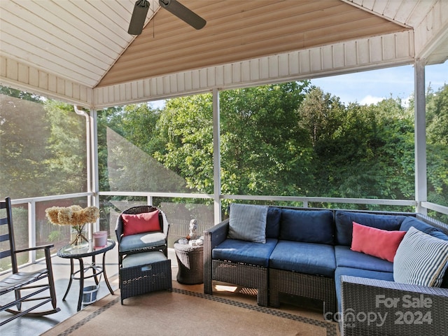 sunroom featuring ceiling fan, wood ceiling, and lofted ceiling