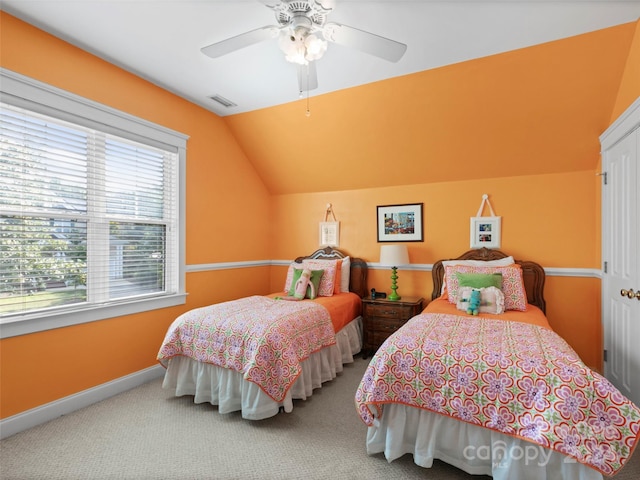 bedroom with carpet, vaulted ceiling, and ceiling fan