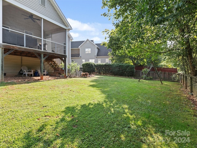 view of yard with a sunroom