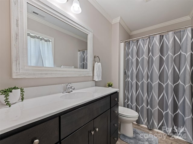 bathroom with crown molding, vanity, toilet, and wood-type flooring