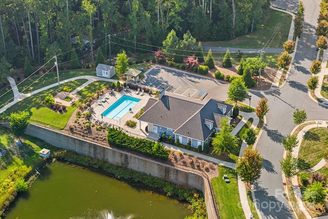 birds eye view of property featuring a water view