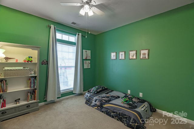 bedroom featuring carpet and ceiling fan