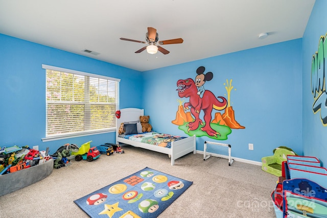 bedroom with light carpet and ceiling fan