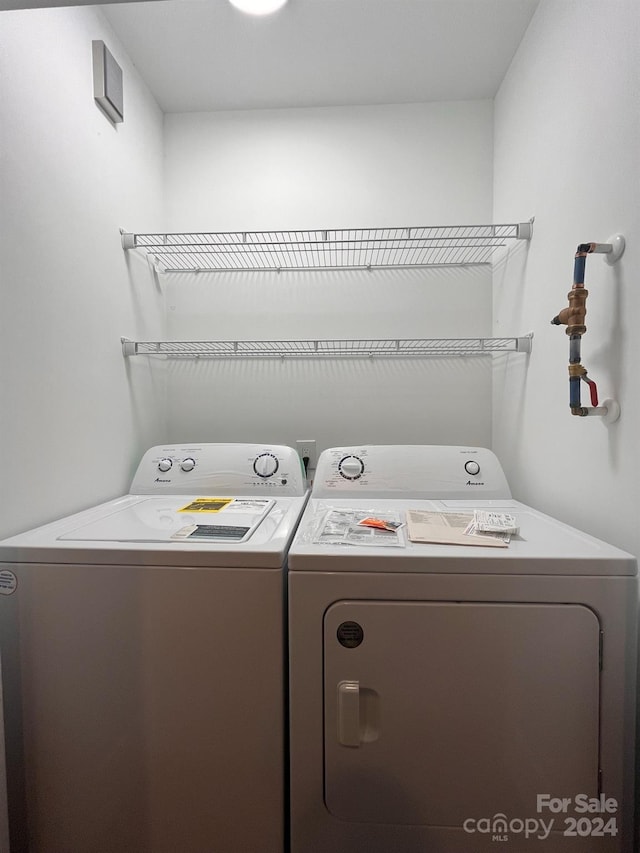 laundry area featuring separate washer and dryer