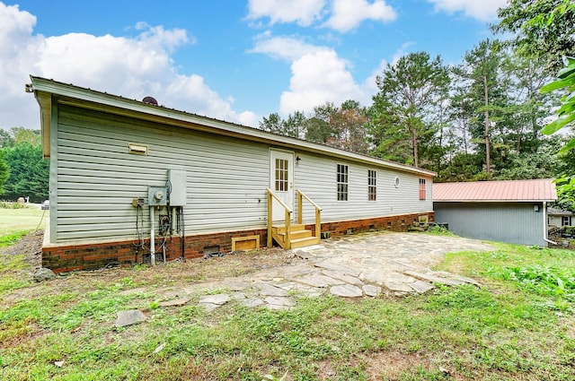 back of house featuring a patio