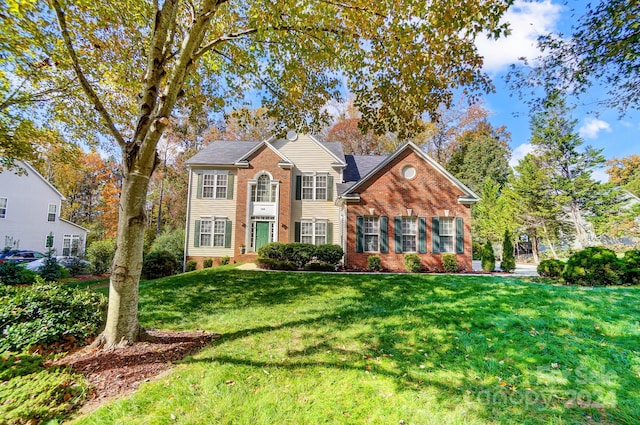 view of property with a front lawn