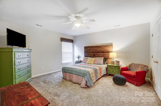 carpeted bedroom with ceiling fan