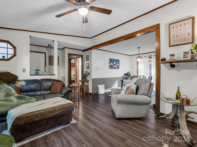 living room with a textured ceiling, hardwood / wood-style floors, ceiling fan, and plenty of natural light