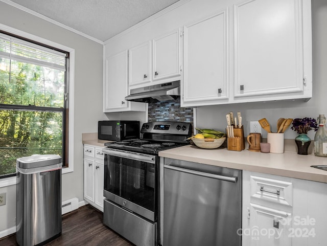 kitchen featuring appliances with stainless steel finishes, white cabinets, a textured ceiling, a baseboard radiator, and ornamental molding