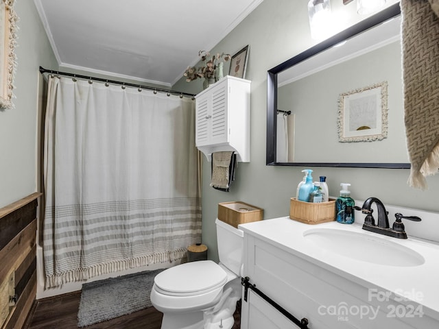 bathroom featuring crown molding, wood-type flooring, vanity, and toilet