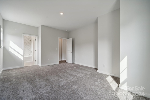 3192 Timber Run Ln, Maiden, NC 28650 - unfurnished bedroom featuring carpet, baseboards, and connected bathroom